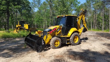 Caterpillar Backhoe for digging trenching and back-filling