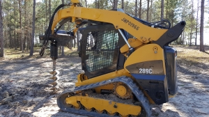 Dozer with excavator auger attachment